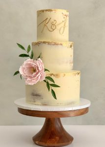 3 tier buttercream wedding cake flowers romantic classic elegant semi naked edible gold leaf sugar peony