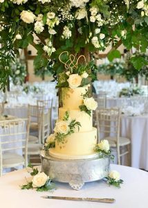 3 tier buttercream wedding cake fresh flowers romantic classic elegant gold leaf