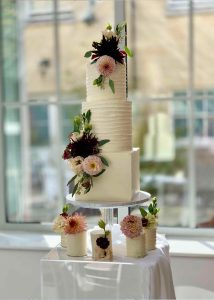 3 tier buttercream wedding cake fresh flowers romantic classic elegant mini cakes square