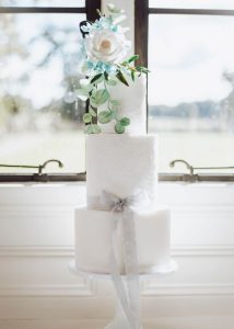 modern romantic classic sugar flowers rose bow lace stencilled textured light airy luxury cake designer modern bespoke stylish cakes
