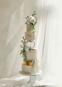 elegant wedding cake white edible gold leaf floating 4 tier bow monogram romantic luxury tall classic