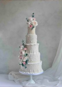 Traditional royal iced wedding cake pink sugar flowers roses piping piped classic romantic 5 tier lambeth vintage elegant luxury