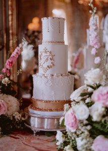 royal iced wedding cake vegan gold white piped lambeth monogram luxury elegant classic tiered traditional edible gold leaf cakes in surrey modern bespoke stylish cakes
