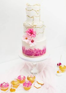 pink wedding cake cosmos sugar flowers gold textured painted cake table cake display cupcakes biscuits wafer paper ruffles